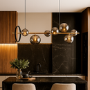 Люстра підвісна золота з чорним Led колом та димчастими плафонами L-90 cm Led+G9x7  12W Modo Bubbles Black+Gold 251131-100006606