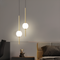 Підвіси подвійні чорні / золоті з кулею D-12 cm 20W Led 4000K Black/Gold Vertical tubes 2 231158-100002757